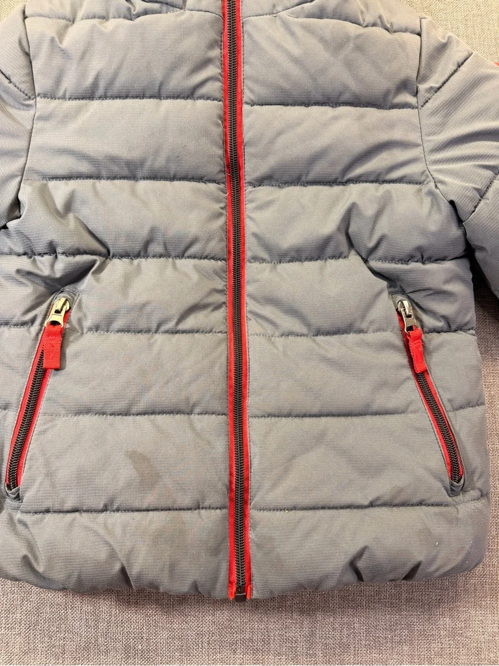 Gray Quilted Hooded Puffer Jacket with Red Trim size 6 kids.